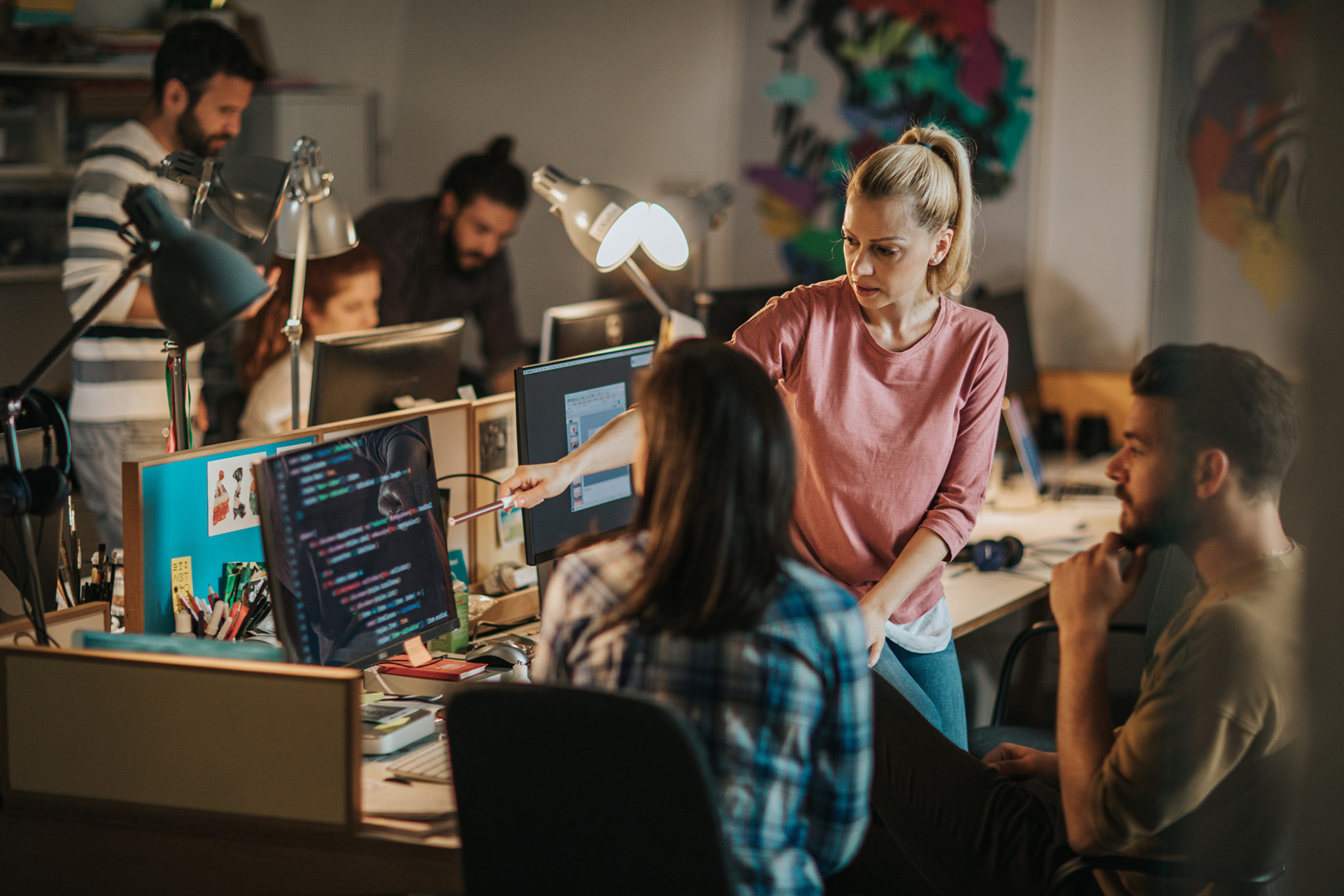 Team-of-young-computer-programmers-working-in-the-office.-1218745653_6720x4480-2048×1365